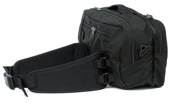 The top pocket of the Hero's Journey in Black (black with grey grid) 400 Halcyon with the padded hip belt connected.